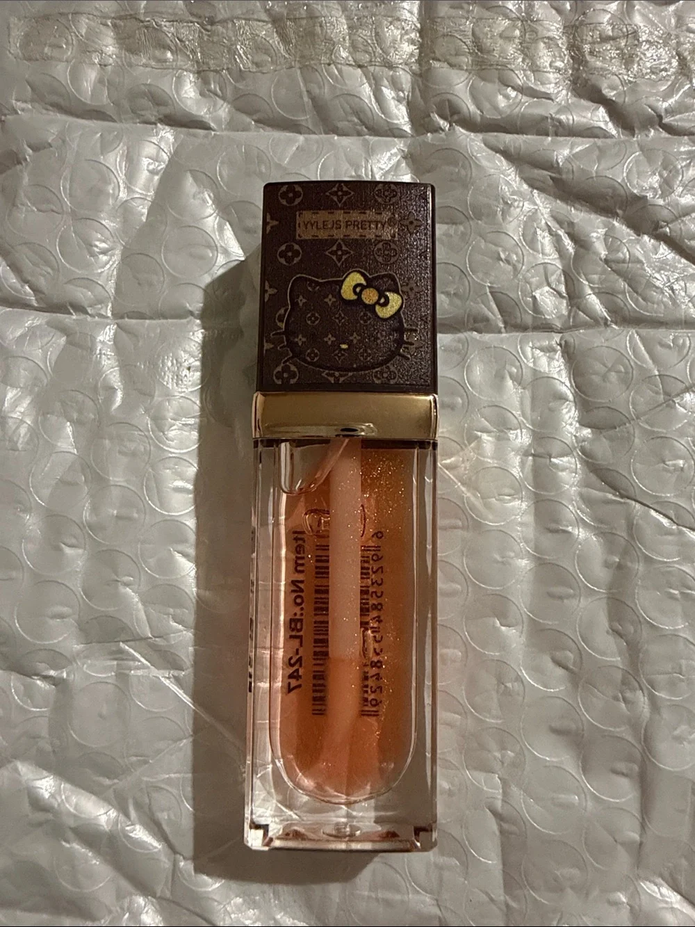 Hello Kitty Shimmery Peach Lip Gloss -